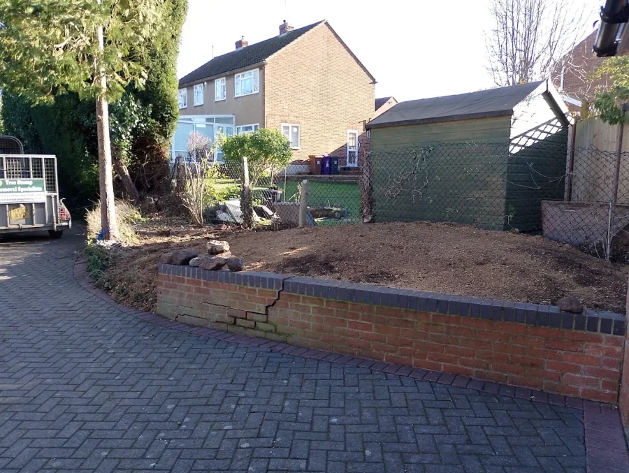 Garden bed levelled after the removal of trees and stumps